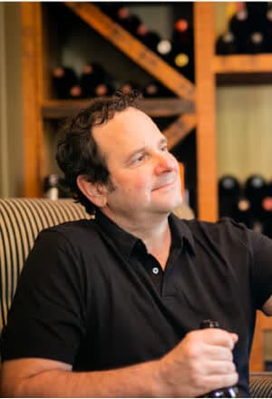 Roland Frasier in the wine cellar